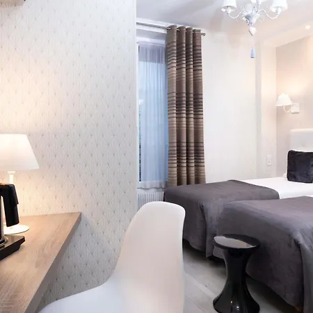 De Genève 3*